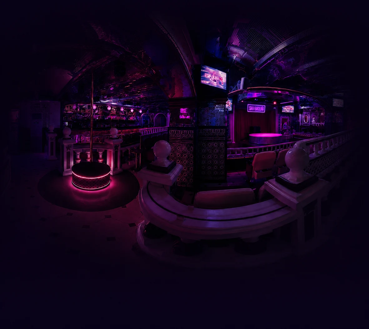 Sala Bagdad Barcelona stage with dark purple and red cabaret lighting